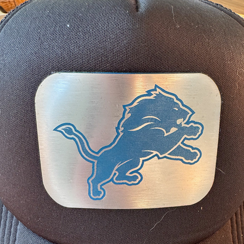 Lions Black Trucker Hat w/ Acrylic