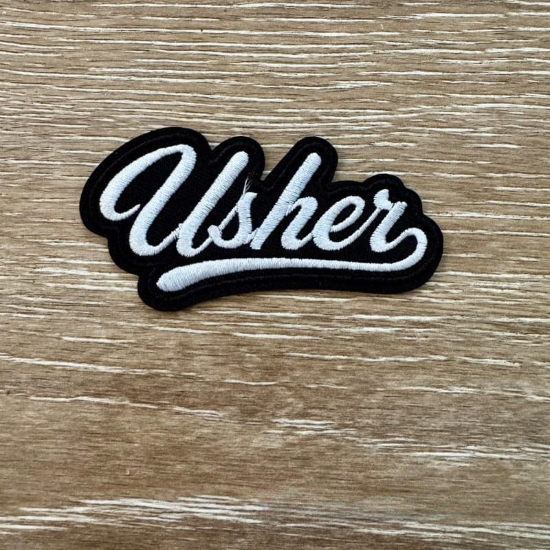 On A Whim Hats Usher Iron-On Patch