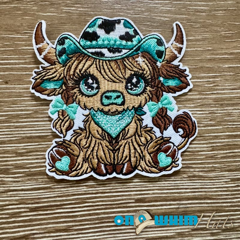 On A Whim Hats Aqua Cowgirl Highland Cow  Iron-On Patch