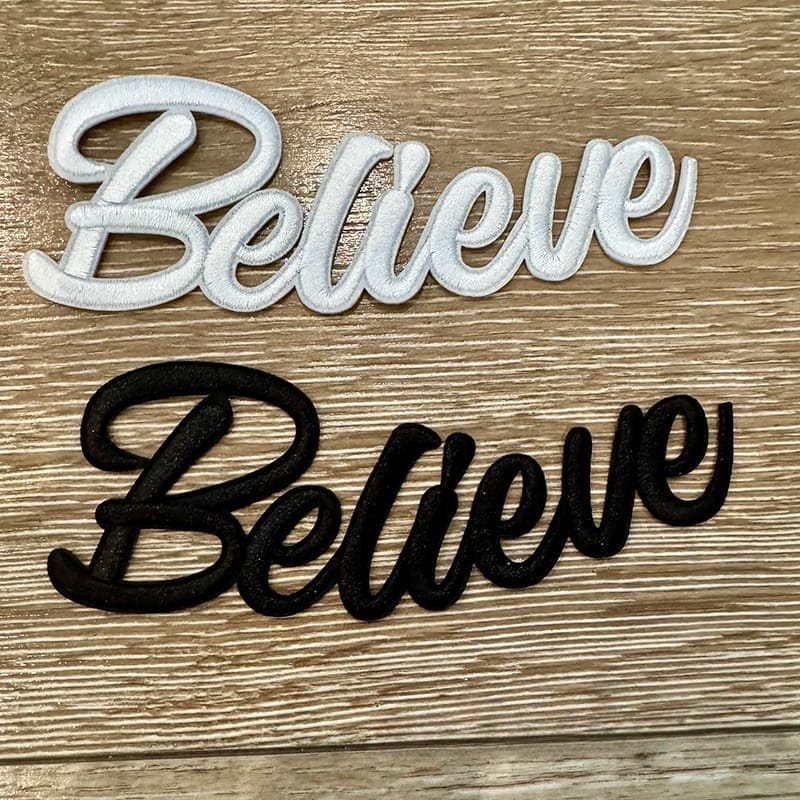 On A Whim Hats Believe Embroidered Iron-On Patch