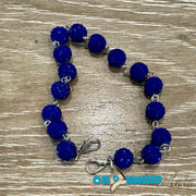 On A Whim Hats Bright Blue Sparkly Hat Chain