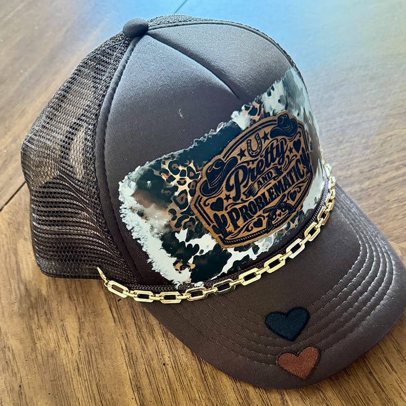 On A Whim Hats Pretty and Problematic Handmade Trucker Hat w/ Leather Patch