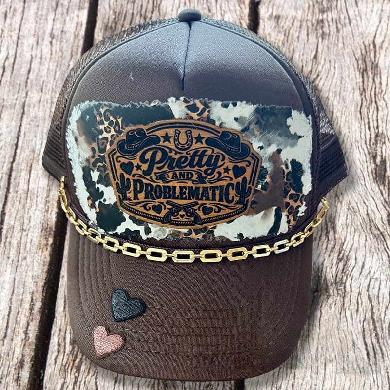 On A Whim Hats Pretty and Problematic Handmade Trucker Hat w/ Leather Patch
