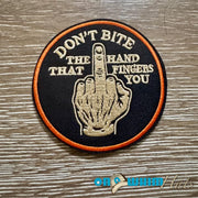 On A Whim Hats Don't Bite The Hand Iron-On Patch
