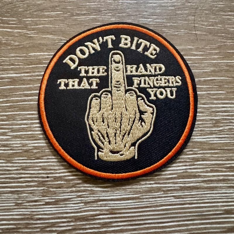 On A Whim Hats Don't Bite The Hand Iron-On Patch