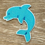 On A Whim Hats Embroidered Dolphin Iron-On Patch