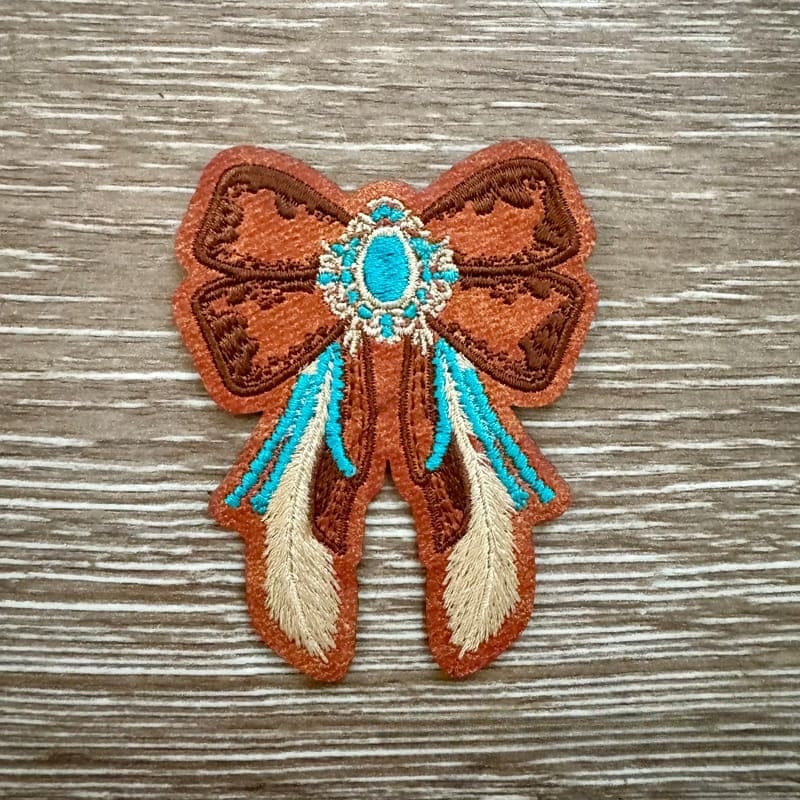 On A Whim Hats Fancy Western Turquoise Bow Leather Iron-On Patch