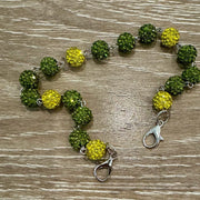 On A Whim Hats Green and Yellow Sparkly Hat Chain