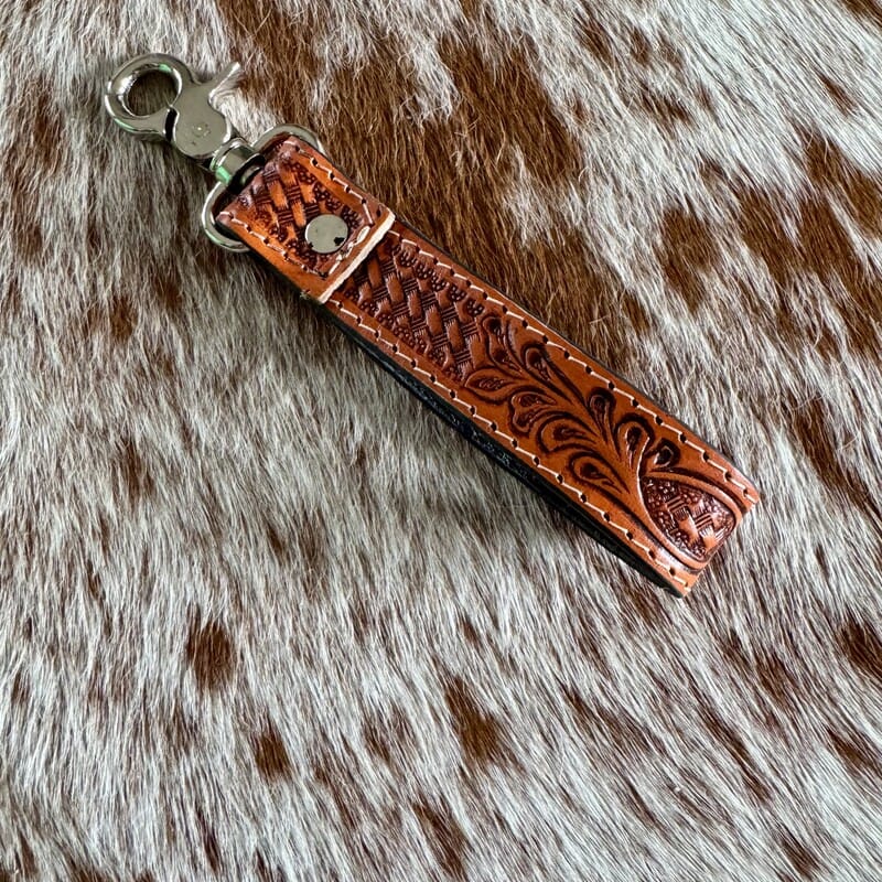Hot Damn Western hand-tooled leather and cowhide keychain detail