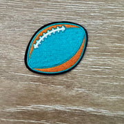 On A Whim Hats Aqua and Orange Football Iron-On Patch