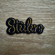 On A Whim Hats Black & Gold Football Script Iron-On Patch