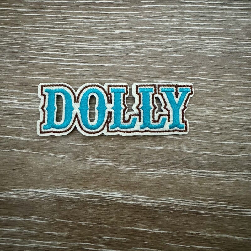 On A Whim Hats Blue &amp; Brown Script Nameplate Iron-On Patch