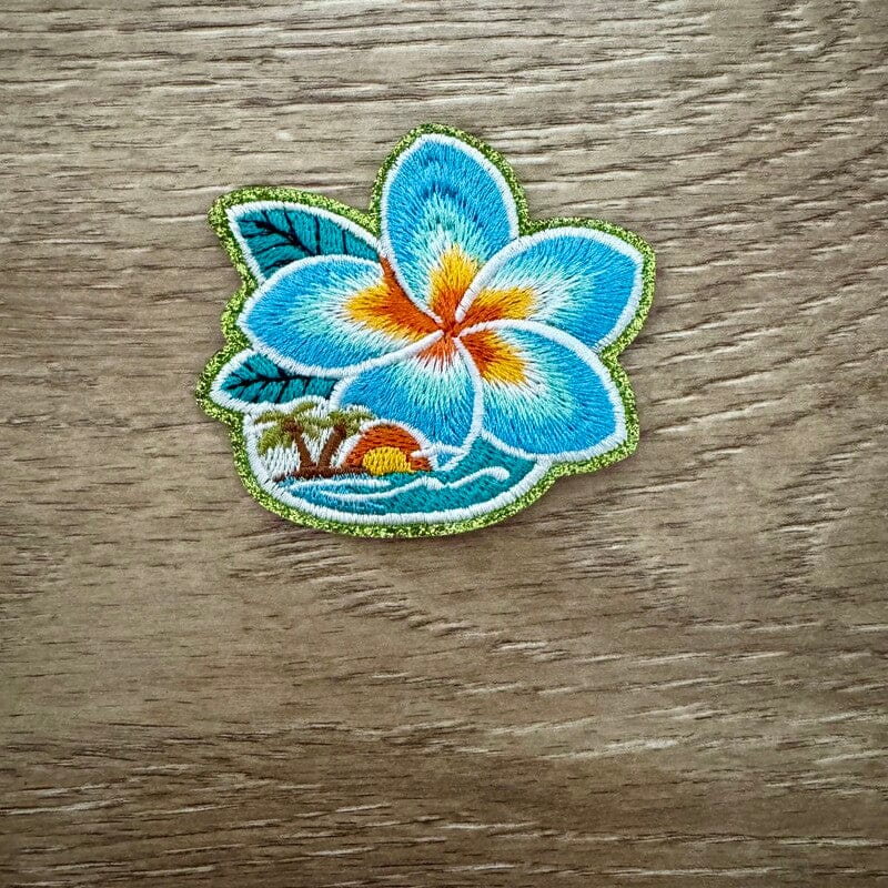 On A Whim Hats Blue Plumeria Beach Iron-On Patch