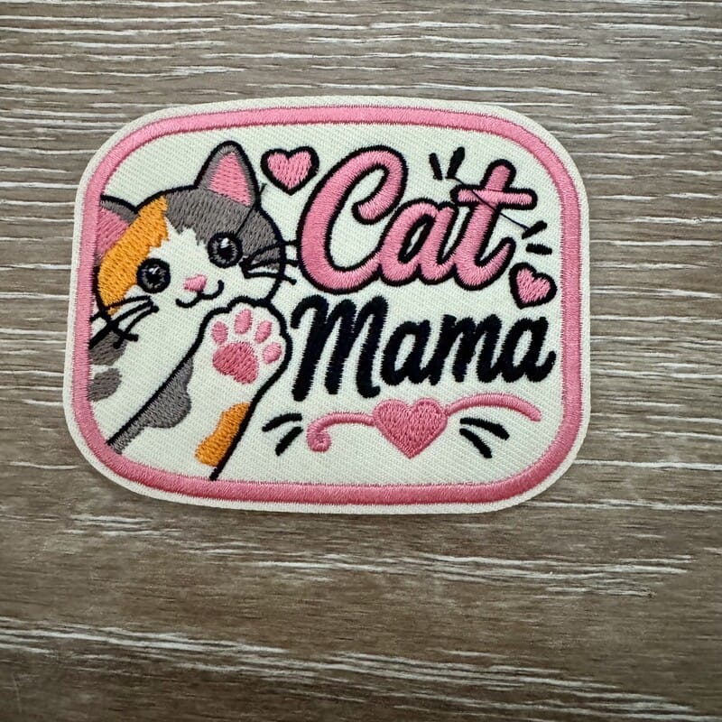 Cat Mama iron-on patch with calico cat and pink heart lettering