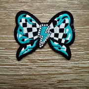 On A Whim Hats Checkered Flame Bow Iron-On Patch