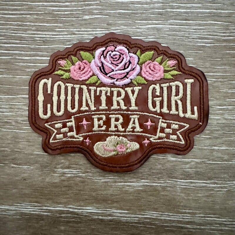 Country Girl Era iron-on patch with pink roses and cowboy hat banner