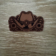 Cowboy hat and sunflowers laser-engraved leather-look iron-on patch with concho band and floral scrollwork by On A Whim Hats
