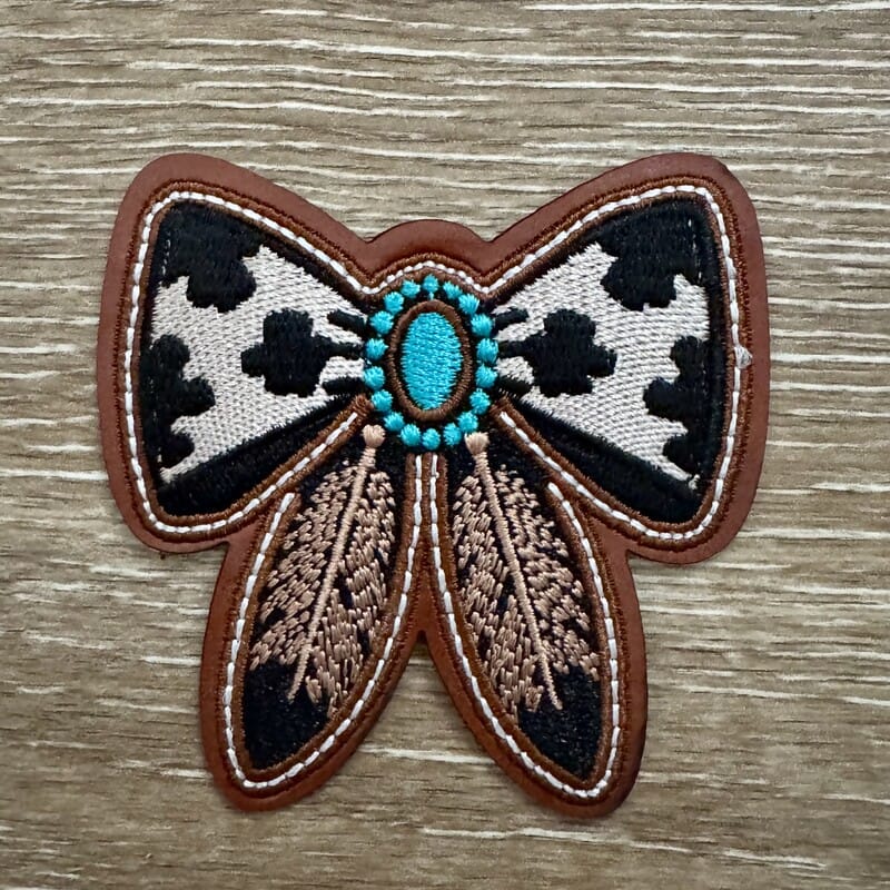 On A Whim Hats Cowhide Concho Bow Iron-On Patch