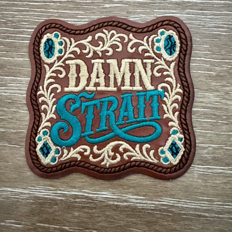 Damn Right western script iron-on patch on tooled leather-look