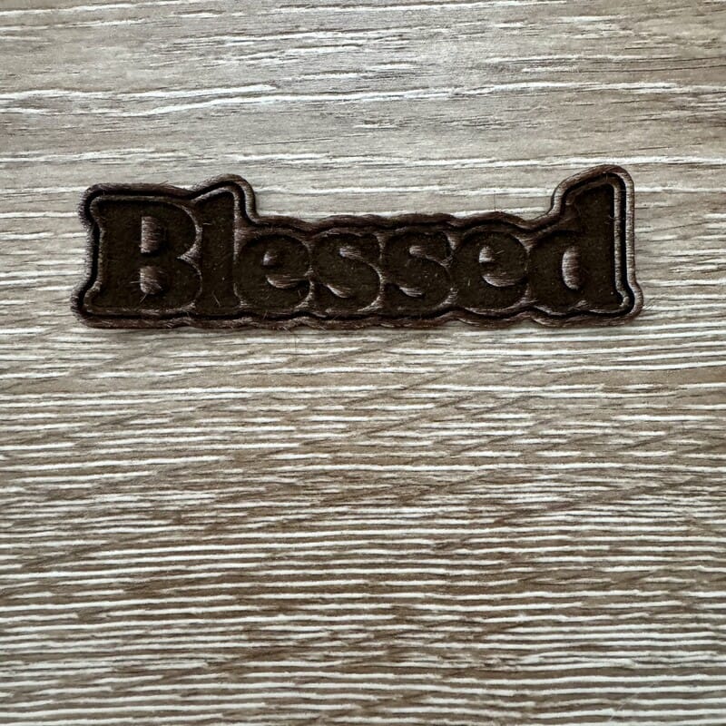 On A Whim Hats Blessed Wood-Tone Iron-On Patch