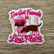 Cowgirl Doxie iron-on patch with a dachshund in a pink cowboy hat, bandana and boots plus country saying by On A Whim Hats