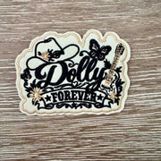 Black and cream Dolly Classic Country Queen Forever iron-on patch with script, cowboy hat, butterflies and guitar
