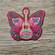 Dolly guitar butterfly love song iron-on patch embroidered in pink, teal and brown with floral and bow details