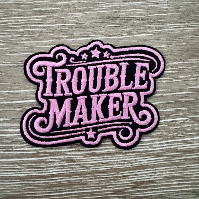 On A Whim Hats Trouble Maker Ornate Script Iron-On Patch