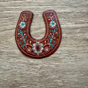 On A Whim Hats Floral Tooled Horseshoe Leather Iron-On Patch