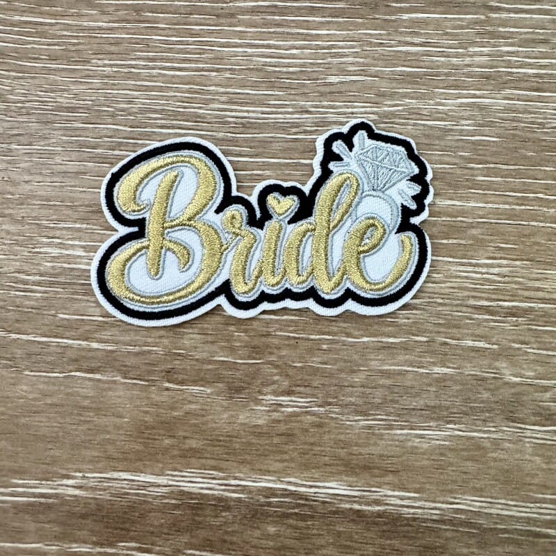 On A Whim Hats Gold Script Bride Diamond Ring Iron-On Patch