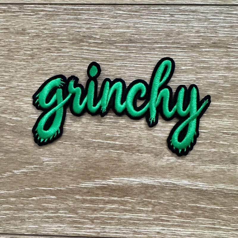 On A Whim Hats Green Drip Script Holiday Iron-On Patch