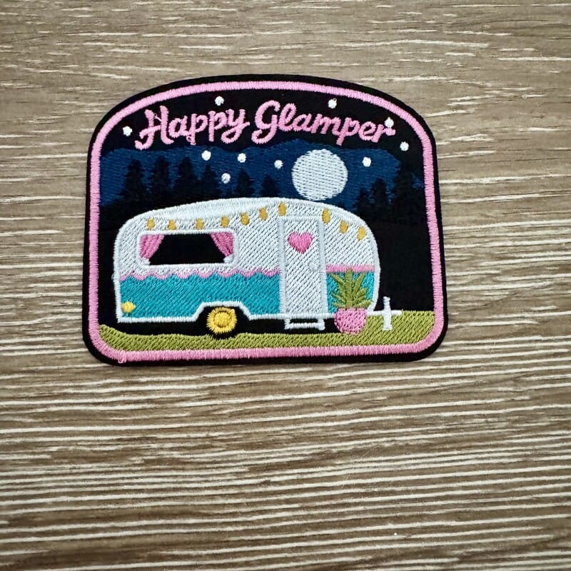 Happy Glamper iron-on patch with retro teal camper, moonlit sky and pink pineapple