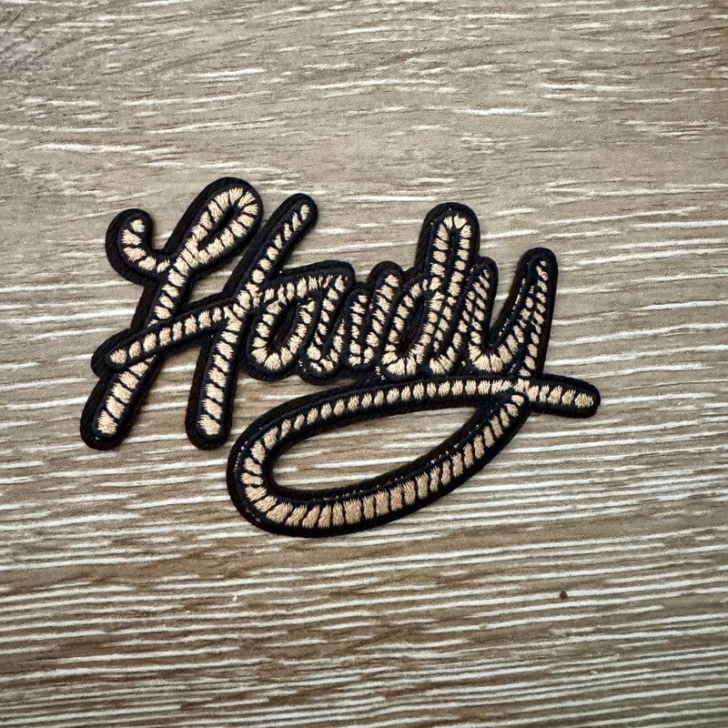 On A Whim Hats Howdy Rope Script Iron-On Patch