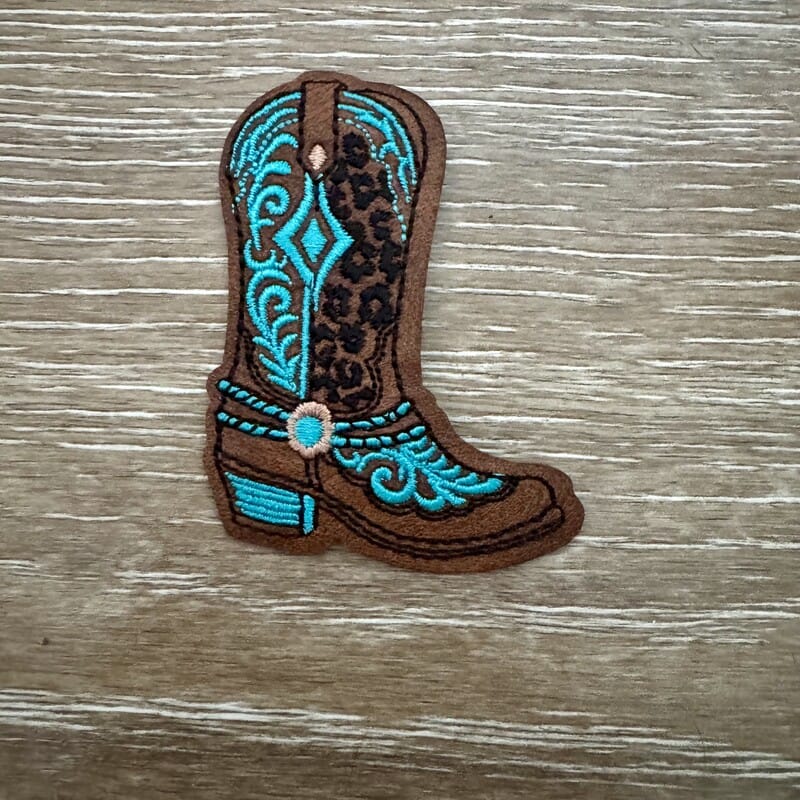 Leopard print cowboy boot iron-on patch with turquoise stitching