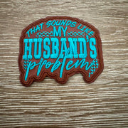 On A Whim Hats My Husband's Problem Iron-On Patch