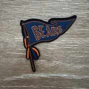 On A Whim Hats Navy and Brown Pennant Flag with Orange Ribbons Iron-On Patch