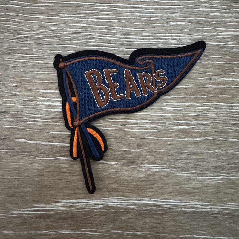 On A Whim Hats Navy and Brown Pennant Flag with Orange Ribbons Iron-On Patch
