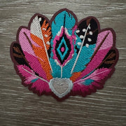 Pink and teal feather fan embroidered iron-on patch with a gray heart in hot pink, orange and turquoise by On A Whim Hats