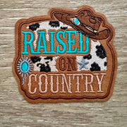 On A Whim Hats Raised On Country Cowhide Iron-On Patch
