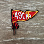 On A Whim Hats Red and Gold Pennant Flag on Pole Iron-On Patch