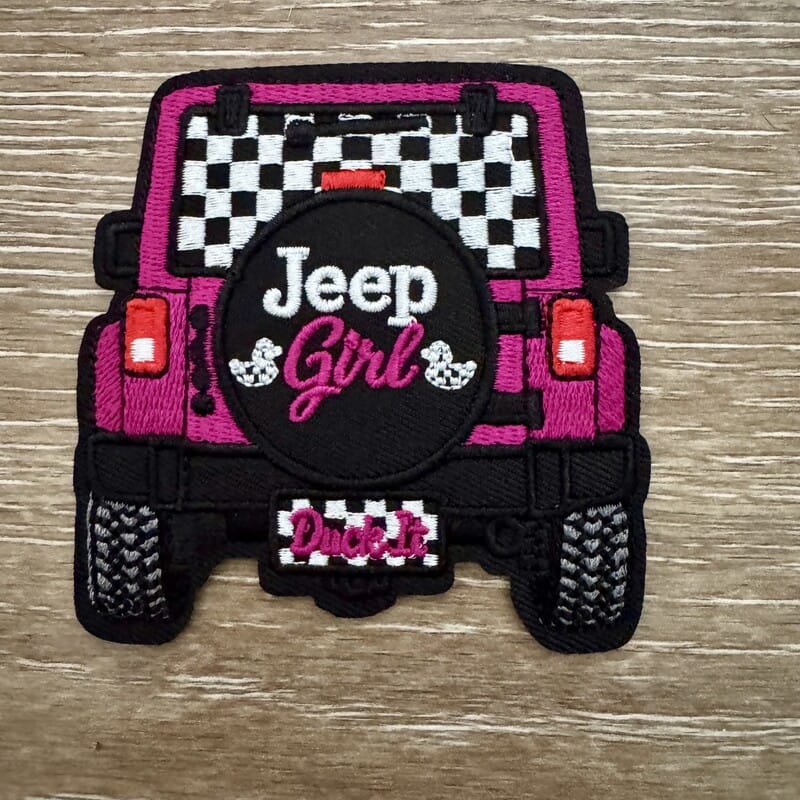 Pink off-road spare tire cover patch with cartoon duck