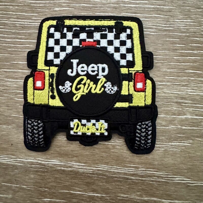 Yellow off-road spare tire cover patch with cartoon duck