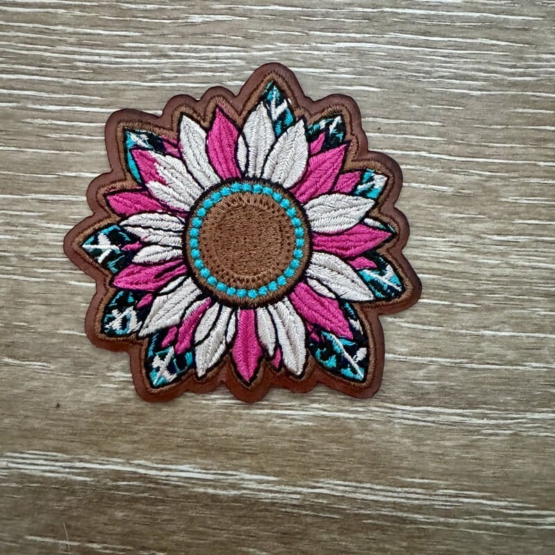 Pink and white sunflower iron-on patch with brown center