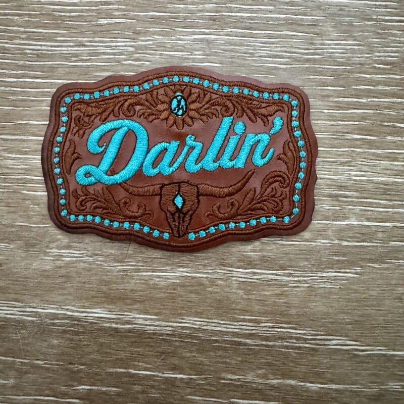 Turquoise Darlin' script tooled leather iron-on patch for western hats