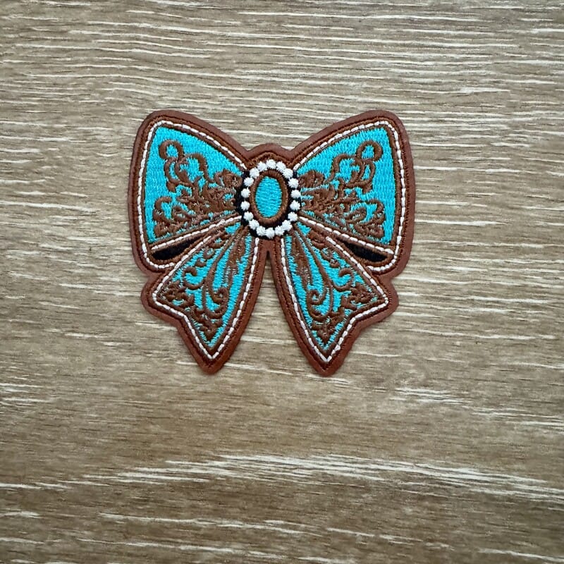 On A Whim Hats Turquoise Western Scroll Bow Iron-On Patch