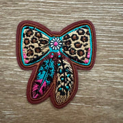 On A Whim Hats Wild West Leopard Feather Bow Iron-On Patch