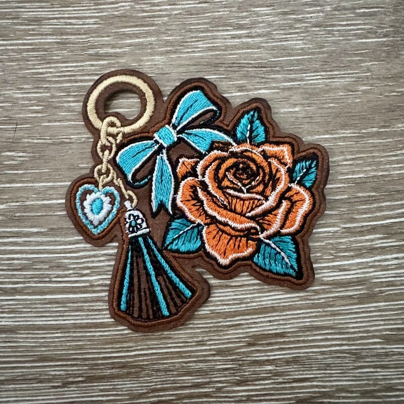 On A Whim Hats Rose Bow Tassel Keychain