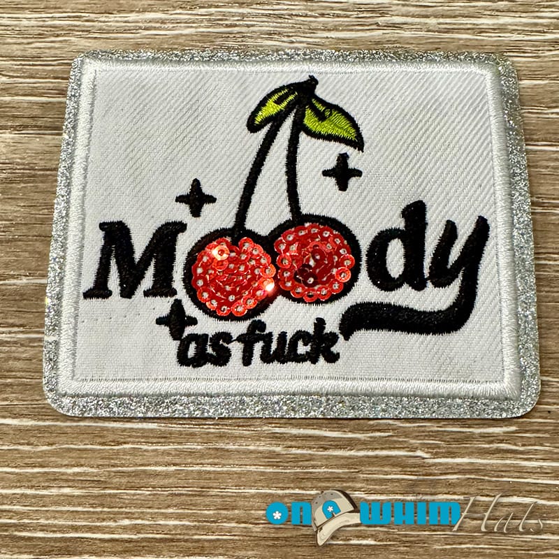 On A Whim Hats Moody as F Embroidered Iron-On Patch