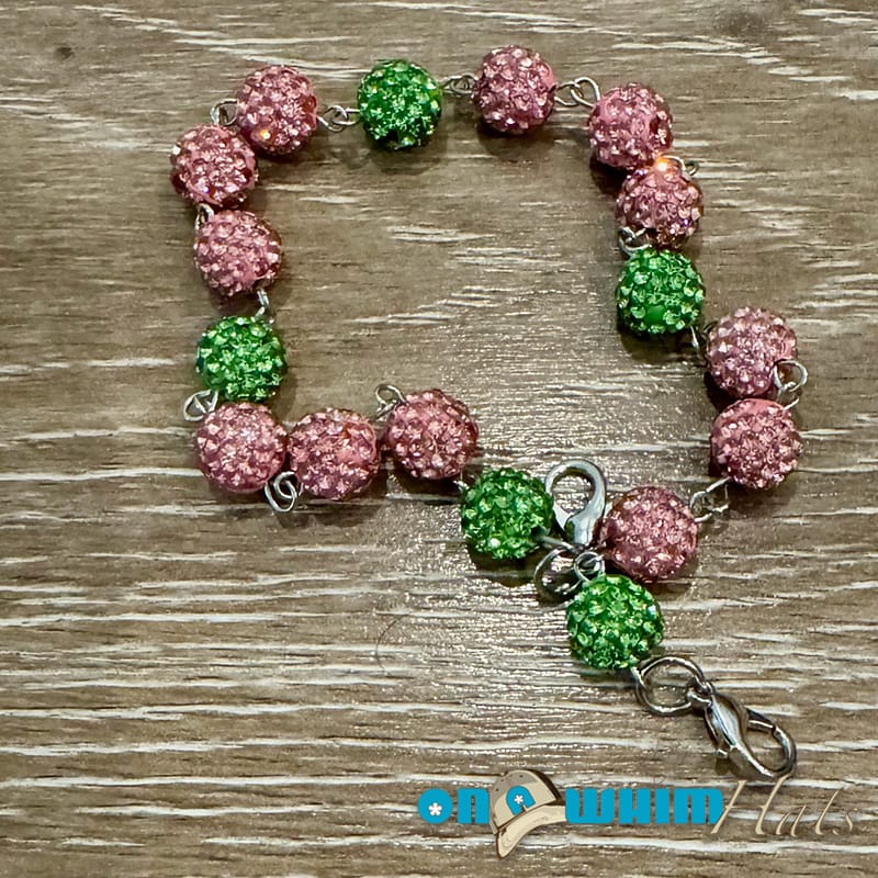 On A Whim Hats Pink and Green Sparkly Hat Chain