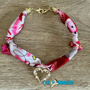 On A Whim Hats Pink and Red Scarf Hat Chain